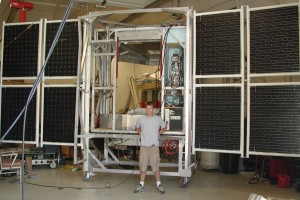 Student in front of BEAST solar panels
